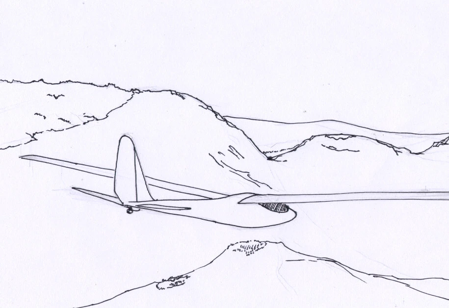 sail plane soaring along a ridge